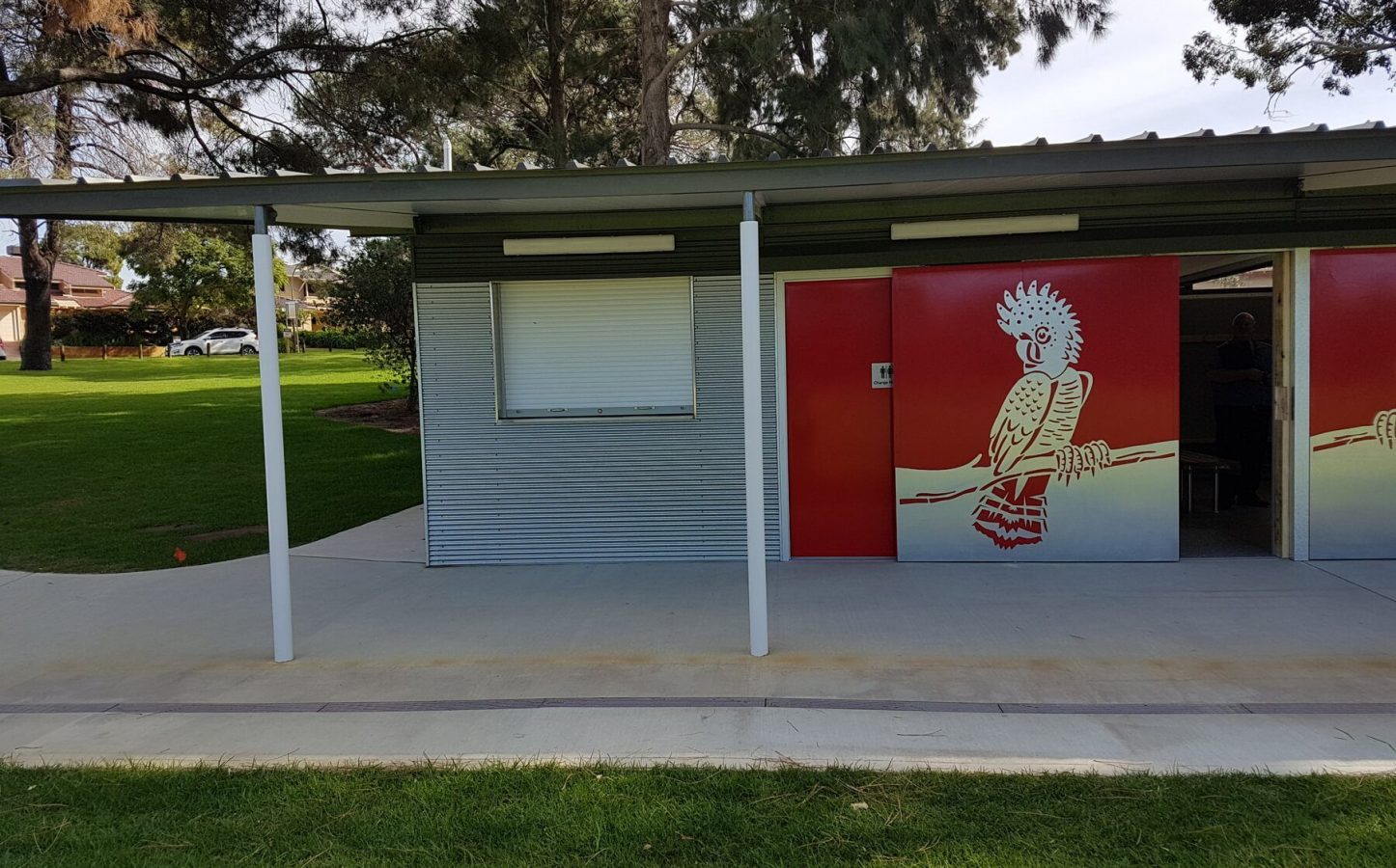 Porter project, ovals and parks - building on an oval with a painted cockatoo on the side